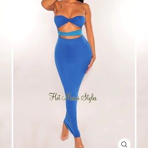 Long blue strapless body con dress. Never worn
